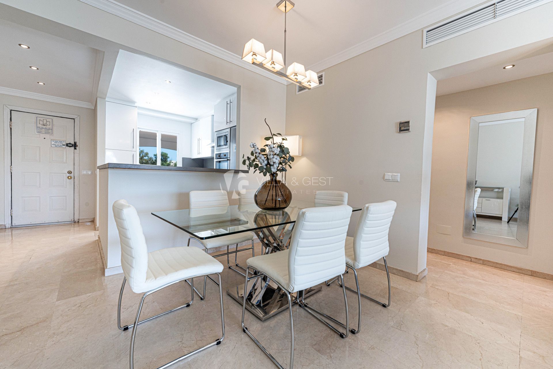 Spacious renovated 2-bedroom apartment in beachfront development on the New Golden Mile