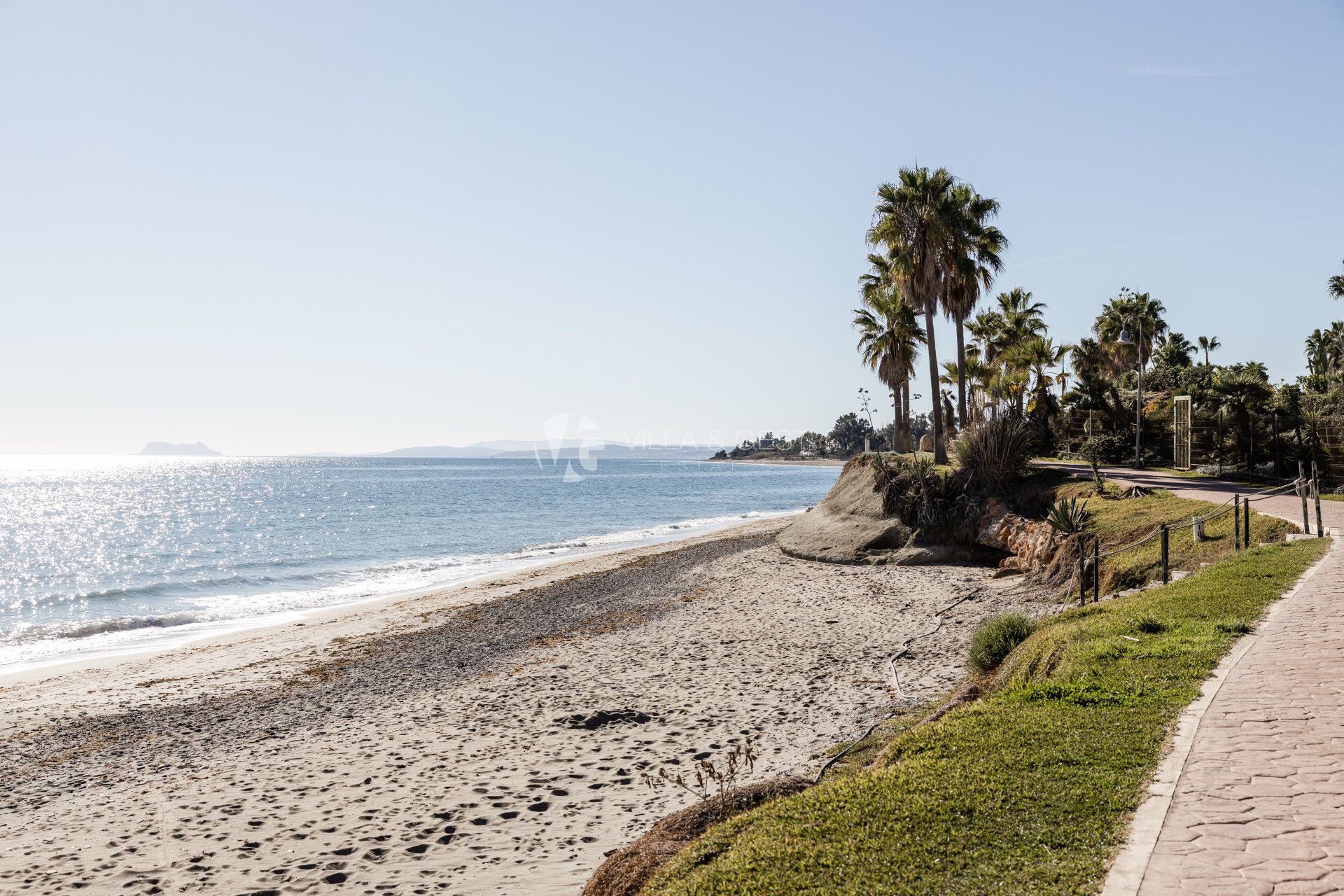 Spacious renovated 2-bedroom apartment in beachfront development on the New Golden Mile